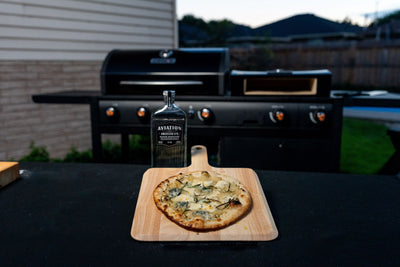 Blue Cheese & Aviation American Gin-braised Onion Pizza with Fresh Rosemary